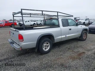 2002 Dodge Dakota Sport with VIN 1B7GL32X12S598558, listed as a IAAI auction lot 41724045 with 231,329 mi miles. Bid and sale history available at carsss.com. Image 4.