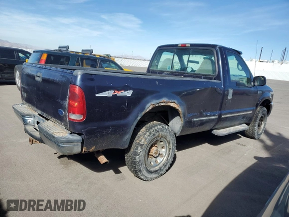 1999 Ford F-250 with VIN 1FTNF21S1XED16309, listed as a Copart auction lot 77267764 with 216,158 mi miles and Clean title. Bid and sale history available at DreamBid. Image 3.