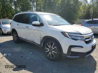2019 Honda Pilot Touring 7-Passenger with VIN 5FNYF6H67KB024507, listed as a Copart auction lot 59041095 with 85,133 mi miles and Salvage title. Bid and sale history available at DreamBid. Image 4.