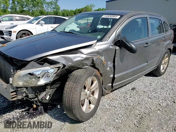 2011 Dodge Caliber Mainstreet z VIN 1B3CB3HA1BD268803, wystawiony jako Copart lot #54800865 z przebiegiem 180 293 mil mil oraz Szkoda całkowita • Salvage title. Historia ofert i sprzedaży dostępna na DreamBid. Obrazek 14.