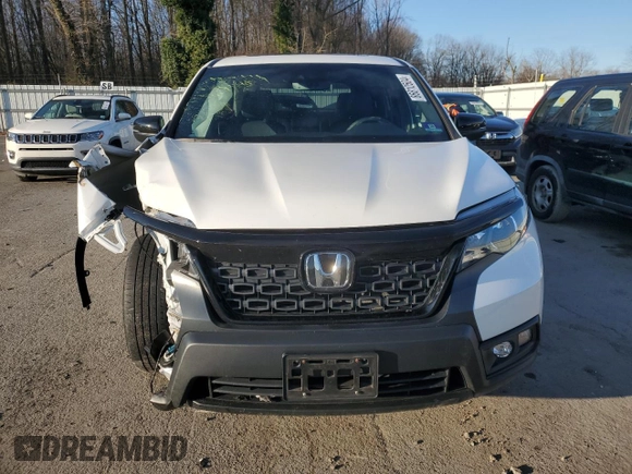 2019 Honda Passport EX-L z VIN 5FNYF8H57KB029404, wystawiony jako Copart lot #86810504 z przebiegiem Nie podano mil oraz Szkoda całkowita • Salvage title. Historia ofert i sprzedaży dostępna na DreamBid. Obrazek 5.