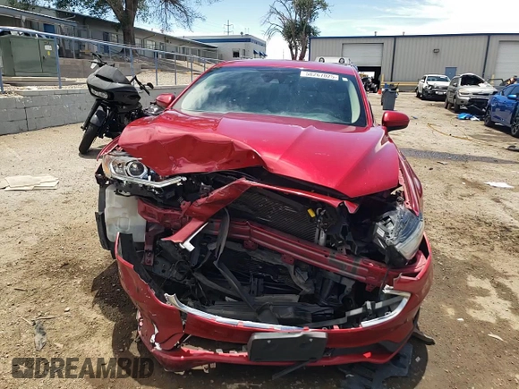 2020 Ford Fusion SE z VIN 3FA6P0HD1LR223770, wystawiony jako Copart lot #58267025 z przebiegiem 103 852 mil mil oraz Szkoda całkowita • Salvage title. Historia ofert i sprzedaży dostępna na DreamBid. Obrazek 14.