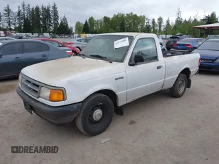 1997 Ford Ranger XLT with VIN 1FTCR10A2VUB88585, listed as a IAAI auction lot 42132083 with 233,961 mi miles. Bid and sale history available at carsss.com. Image 2.