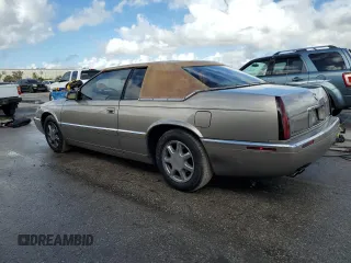 2000 Cadillac Eldorado z VIN 1G6EL12Y7YB703863, wystawiony jako Copart lot #85433244 z przebiegiem 175 416 mil mil oraz Szkoda całkowita • Salvage title. Historia ofert i sprzedaży dostępna na DreamBid. Obrazek 2.