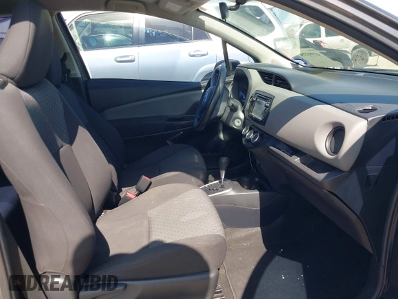 2015 Toyota Yaris L with VIN VNKJTUD33FA054166, listed as a IAAI auction lot 41993354 with 98,657 mi miles and . Bid and sale history available at DreamBid. Image 5.