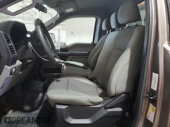 2018 Ford F-150 XL with VIN 1FTMF1EB4JKC19744, listed as a Copart auction lot 57333825 with 81,550 mi miles and Salvage title. Bid and sale history available at DreamBid. Image 7.