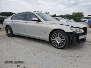 2015 BMW 7 Series 750Li z VIN WBAYE8C56FD781213, wystawiony jako Copart lot #55843955 z przebiegiem 63 899 mil mil oraz Szkoda całkowita • Salvage title. Historia ofert i sprzedaży dostępna na DreamBid. Obrazek 4.