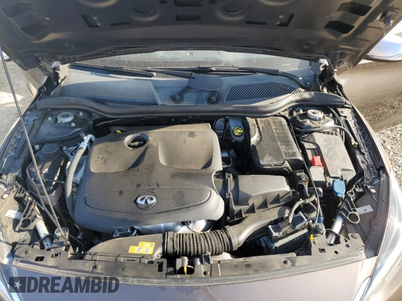 2018 Infiniti QX30 Premium with VIN SJKCH5CR5JA049653, listed as a Copart auction lot 68021414 with 73,898 mi miles and Salvage Title. Bid and sale history available at carsss.com. Image 12.