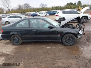 1998 Honda Civic EX with VIN 1HGEJ8243WL023329, listed as a IAAI auction lot 41744919 with 0 mi miles. Bid and sale history available at carsss.com. Image 13.