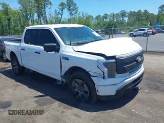 2024 Ford F-150 Lightning XLT with VIN 1FTVW3LK6RWG26665, listed as a IAAI auction lot 42337628 with 2,936 mi miles and . Bid and sale history available at DreamBid. Image 1.