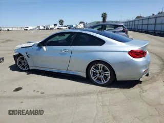 2015 BMW M4 with VIN WBS3R9C52FK334020, listed as a Copart auction lot 51867985 with 95,369 mi miles and Salvage title. Bid and sale history available at DreamBid. Image 2.