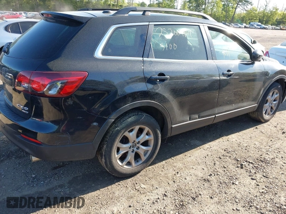 2014 Mazda CX-9 Touring with VIN JM3TB3CV4E0444786, listed as a IAAI auction lot 42249827 with Not provided miles and . Bid and sale history available at DreamBid. Image 4.