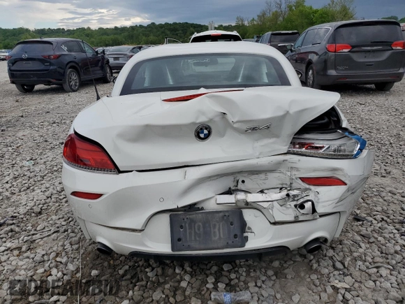 2011 BMW Z4 sDrive35is z VIN WBALM1C59BE393773, wystawiony jako Copart lot #56021935 z przebiegiem 86 666 mil mil oraz Szkoda całkowita • Salvage title. Historia ofert i sprzedaży dostępna na DreamBid. Obrazek 6.