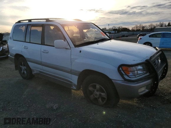 2000 Toyota Land Cruiser z VIN JT3HT05J0Y0122711, wystawiony jako Copart lot #86929954 z przebiegiem Nie podano mil oraz Czysty tytuł • Clean title. Historia ofert i sprzedaży dostępna na DreamBid. Obrazek 4.