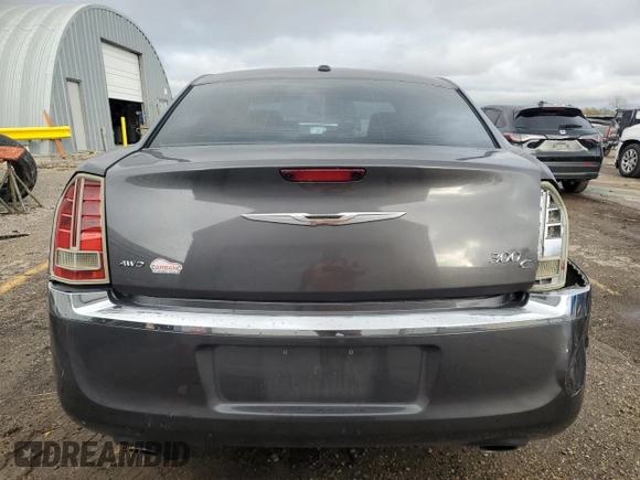 2013 Chrysler 300 with VIN 2C3CCAKT5DH686527, listed as a Copart auction lot 80895034 with 128,703 mi miles and Salvage Title. Bid and sale history available at carsss.com. Image 6.