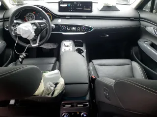 2023 Genesis GV70 Advanced with VIN 5NMMCET14PH000281, listed as a Copart auction lot 57876395 with 24,842 mi miles and Salvage title. Bid and sale history available at DreamBid. Image 8.