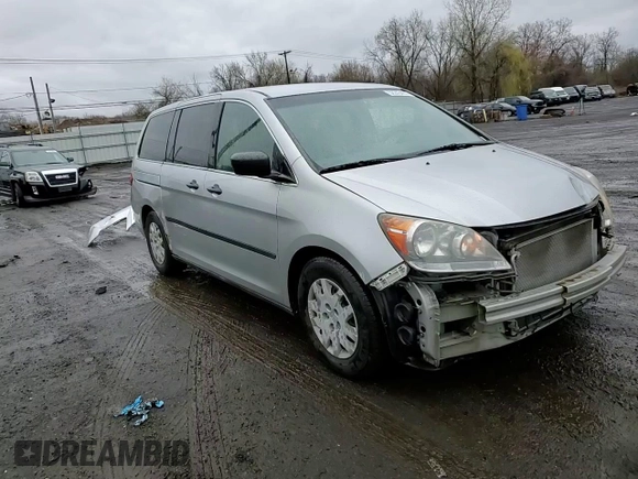 2010 Honda Odyssey LX z VIN 5FNRL3H20AB012805, wystawiony jako Copart lot #52243405 z przebiegiem 206 479 mil mil oraz Szkoda całkowita • Salvage title. Historia ofert i sprzedaży dostępna na DreamBid. Obrazek 11.
