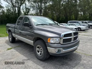 2003 Dodge 1500 SLT z VIN 1D7HU18N83J525535, wystawiony jako Copart lot #61195505 z przebiegiem 125 319 mil mil oraz Czysty tytuł • Clean title. Historia ofert i sprzedaży dostępna na DreamBid. Obrazek 1.