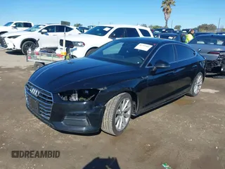 2018 Audi A5 Sportback Premium z VIN WAUANCF53JA009200, wystawiony jako IAAI lot #41725501 z przebiegiem 107 076 mil mil oraz . Historia ofert i sprzedaży dostępna na DreamBid. Obrazek 18.