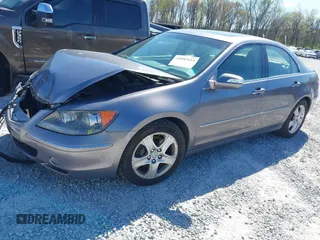 2007 Acura RL Tech Pkg with VIN JH4KB16647C002703, listed as a IAAI auction lot 41882614 with 174,713 mi miles. Bid and sale history available at carsss.com. Image 2.