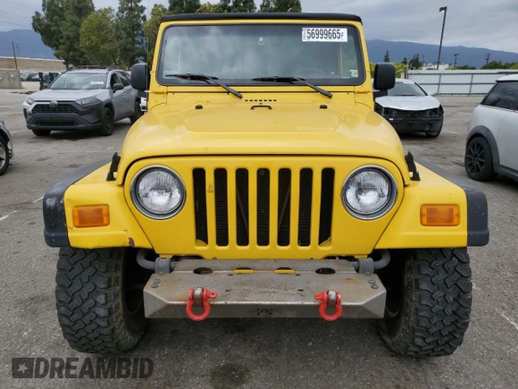 2004 Jeep Wrangler Rubicon with VIN 1J4FA69SX4P768963, listed as a Copart auction lot 56999665 with 91,949 mi miles and Salvage title. Bid and sale history available at DreamBid. Image 5.