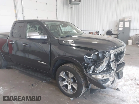 2020 Ram 1500 Laramie with VIN 1C6SRFDT7LN142009, listed as a IAAI auction lot 42330341 with 108,351 mi miles and . Bid and sale history available at DreamBid. Image 6.