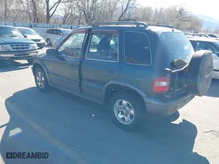 2002 Kia Sportage with VIN KNDJA723925120001, listed as a IAAI auction lot 41931419 with 145,675 mi miles. Bid and sale history available at carsss.com. Image 3.