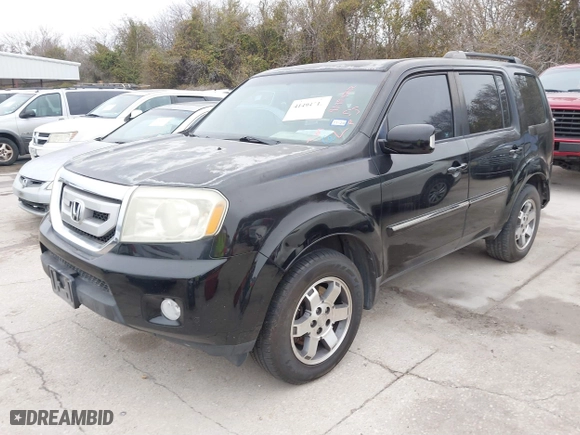 2010 Honda Pilot Touring with VIN 5FNYF4H89AB034007, listed as a IAAI auction lot 41494712 with 318,710 mi miles. Bid and sale history available at carsss.com. Image 17.