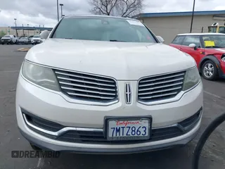 2016 Lincoln MKX Select with VIN 2LMTJ6KR5GBL30010, listed as a IAAI auction lot 41741385 with 112,647 mi miles. Bid and sale history available at carsss.com. Image 12.