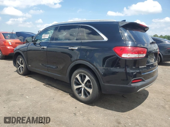 2016 Kia Sorento EX with VIN 5XYPHDA16GG033238, listed as a Copart auction lot 60362415 with 121,220 mi miles and Salvage title. Bid and sale history available at DreamBid. Image 2.
