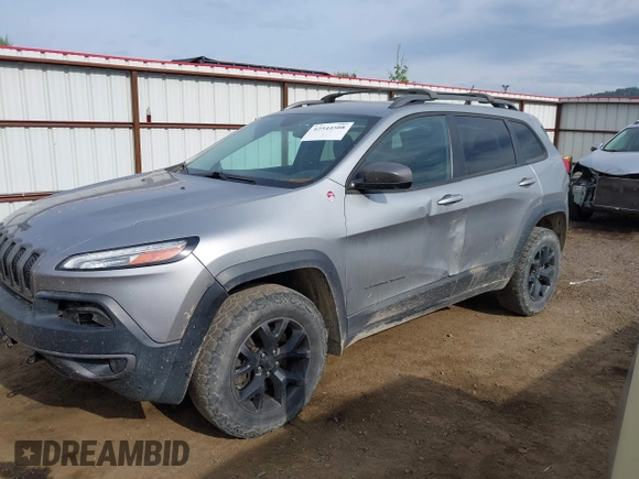 2015 Jeep Cherokee Trailhawk with VIN 1C4PJMBS0FW522182, listed as a IAAI auction lot 42544508 with 74,910 mi miles and . Bid and sale history available at DreamBid. Image 17.