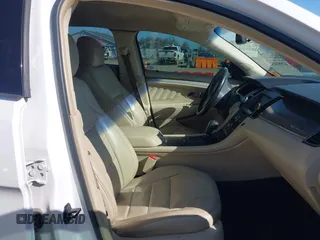 2014 Ford Taurus SEL z VIN 1FAHP2E81EG104137, wystawiony jako IAAI lot #42054432 z przebiegiem 146 046 mil mil oraz . Historia ofert i sprzedaży dostępna na DreamBid. Obrazek 5.