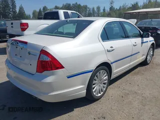 2010 Ford Fusion Hybrid with VIN 3FADP0L38AR395166, listed as a IAAI auction lot 42814717 with 43,099 mi miles and . Bid and sale history available at DreamBid. Image 4.
