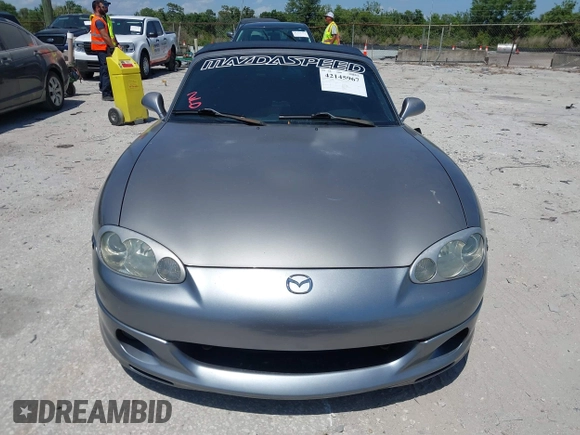 2003 Mazda MX-5 Miata Cloth with VIN JM1NB353930311340, listed as a IAAI auction lot 42145967 with 194,740 mi miles and . Bid and sale history available at DreamBid. Image 13.