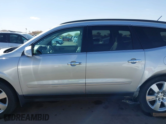 2014 Chevrolet Traverse LTZ with VIN 1GNKRJKD2EJ185682, listed as a IAAI auction lot 41728837 with 79,516 mi miles and . Bid and sale history available at DreamBid. Image 14.