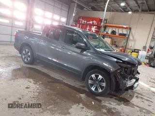 2019 Honda Ridgeline RTL z VIN 5FPYK2F54KB005791, wystawiony jako IAAI lot #41285980 z przebiegiem 49 729 mil mil oraz . Historia ofert i sprzedaży dostępna na DreamBid. Obrazek 1.