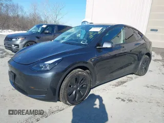 2025 Tesla Model Y Long Range with VIN 7SAYGDED0SF256230, listed as a IAAI auction lot 41356520 with 262 mi miles and . Bid and sale history available at DreamBid. Image 22.