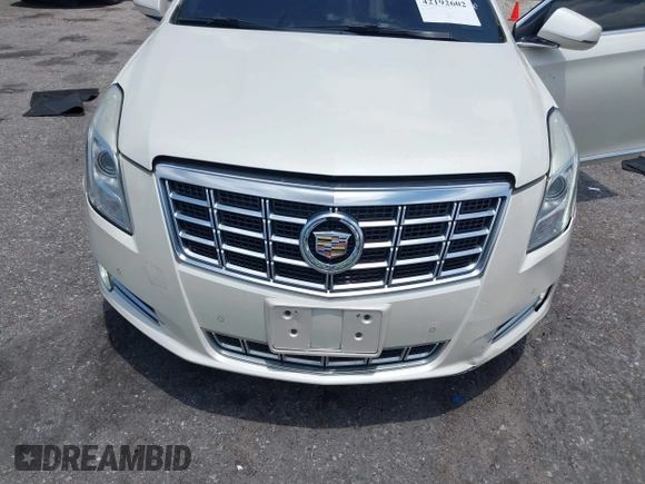 2013 Cadillac XTS Luxury with VIN 2G61P5S38D9160016, listed as a IAAI auction lot 42192602 with 134,879 mi miles and . Bid and sale history available at DreamBid. Image 6.