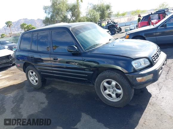 1999 Toyota RAV4 with VIN JT3GP10V9X7058125, listed as a IAAI auction lot 42056633 with 247,015 mi miles and . Bid and sale history available at DreamBid. Image 12.