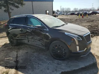 2022 Cadillac XT5 AWD Premium Luxury with VIN 1GYKNDRS7NZ164512, listed as a Copart auction lot 49236945 with 30,019 mi miles and Salvage title. Bid and sale history available at DreamBid. Image 4.