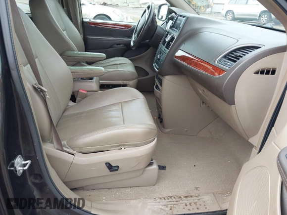 2014 Chrysler Town & Country Touring L with VIN 2C4RC1CG5ER378194, listed as a IAAI auction lot 42176454 with 178,448 mi miles and . Bid and sale history available at carsss.com. Image 5.