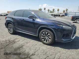 2020 Lexus RX with VIN 2T2AZMAA0LC164766, listed as a Copart auction lot 69867914 with 101,104 mi miles and Salvage Title. Bid and sale history available at carsss.com. Image 4.
