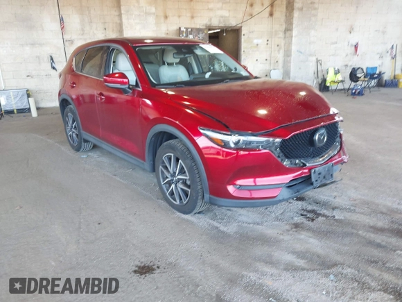 2018 Mazda CX-5 Grand Touring with VIN JM3KFBDM8J0461293, listed as a IAAI auction lot 41694070 with 72,240 mi miles. Bid and sale history available at carsss.com. Image 1.