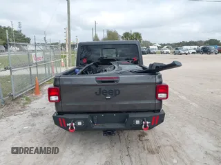 2022 Jeep Gladiator Texas Trail z VIN 1C6HJTAG0NL162804, wystawiony jako IAAI lot #41524087 z przebiegiem 17 652 mil mil oraz . Historia ofert i sprzedaży dostępna na DreamBid. Obrazek 17.