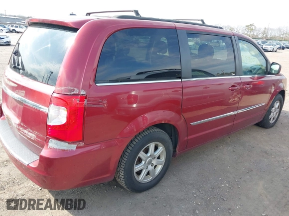 2012 Chrysler Town & Country Touring with VIN 2C4RC1BG5CR400323, listed as a IAAI auction lot 41902471 with 999,999 mi miles. Bid and sale history available at carsss.com. Image 4.