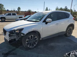 2016 Mazda CX-5 Grand Touring with VIN JM3KE2DYXG0735303, listed as a Copart auction lot 47115665 with 140,322 mi miles and Salvage Title. Bid and sale history available at carsss.com. Image 1.