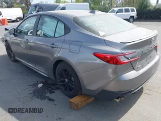 2025 Toyota Camry LE with VIN 4T1DAACK6SU565152, listed as a IAAI auction lot 41825174 with 297 mi miles and . Bid and sale history available at DreamBid. Image 3.