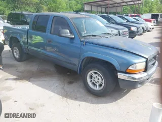 2002 Dodge Dakota SLT with VIN 1B7HL48XX2S651047, listed as a IAAI auction lot 42024449 with 138,903 mi miles. Bid and sale history available at carsss.com. Image 1.