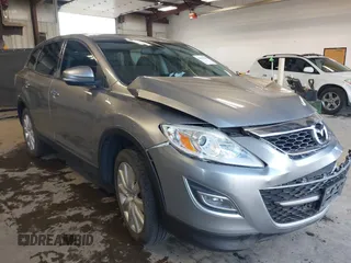 2010 Mazda CX-9 Touring z VIN JM3TB3MV2A0202488, wystawiony jako IAAI lot #42142544 z przebiegiem 94 126 mil mil oraz . Historia ofert i sprzedaży dostępna na DreamBid. Obrazek 1.