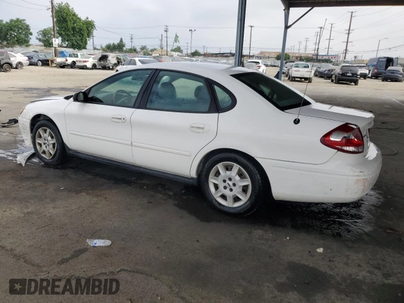 2006 Ford Taurus SE with VIN 1FAHP53U86A237001, listed as a Copart auction lot 62858785 with 133,697 mi miles and Salvage title. Bid and sale history available at DreamBid. Image 2.
